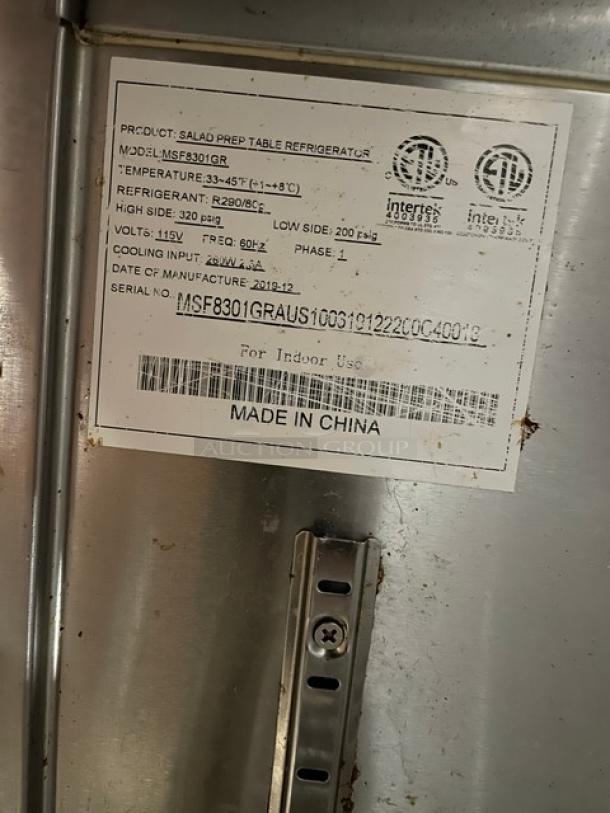 Atosa 2019 commercial stainless steel refrigerated prep table, model MSF8301GR, with poly-coated wire rack, on casters.