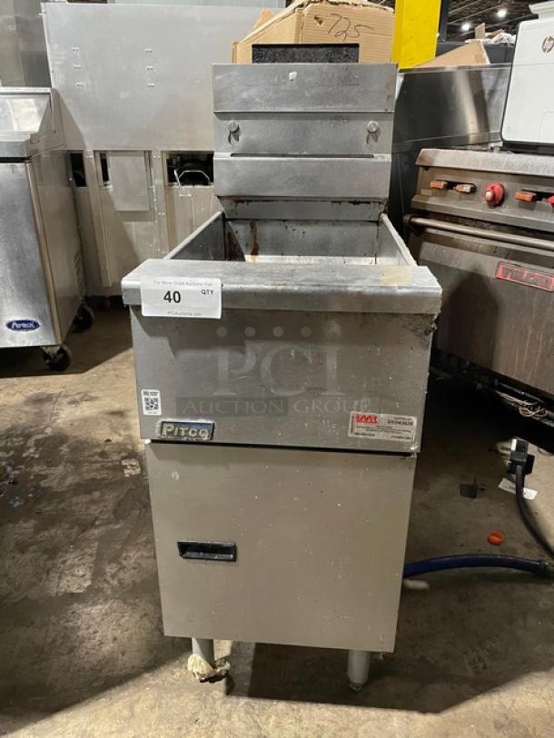 Pitco VF35S commercial stainless steel 35 lb. deep fat fryer with back splash, basket hanger, and blue gas connector hose.
