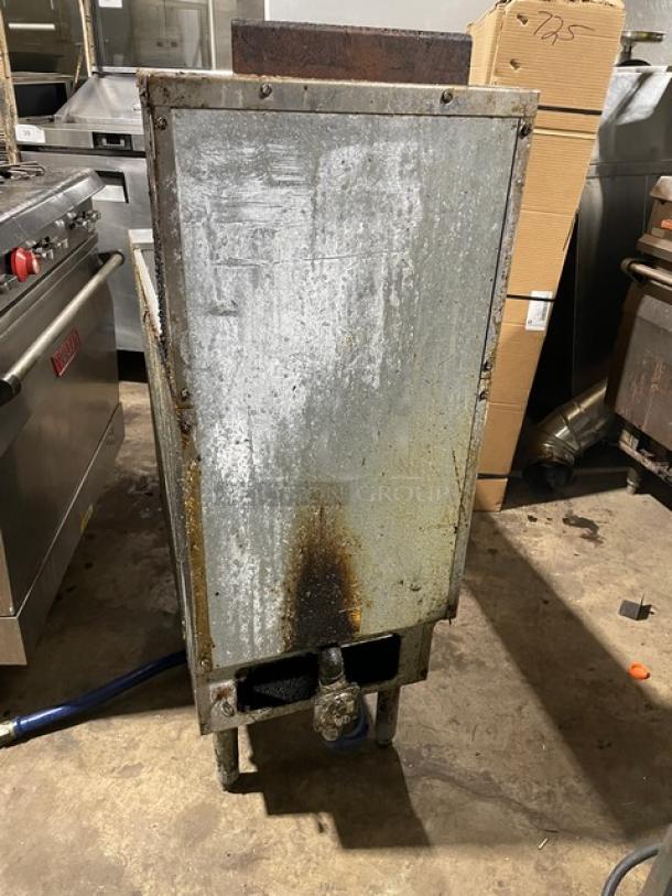 Pitco VF35S stainless steel natural gas fryer, 35 lb capacity, back splash, basket hanger, blue gas hose, on legs, used condition.
