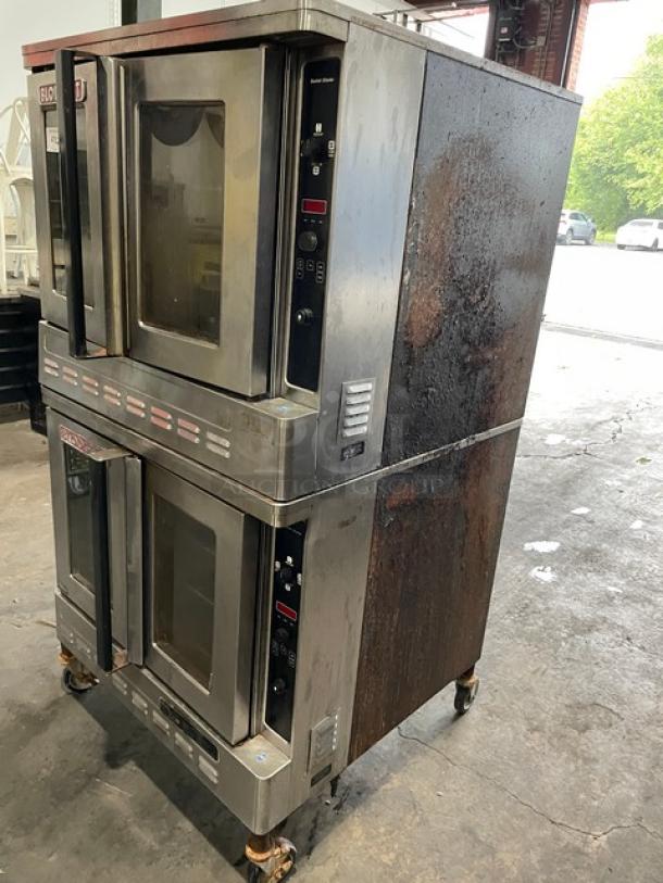 Blodgett Solid State Series double stacked convection oven, stainless steel, natural gas, on casters, with wired racks.