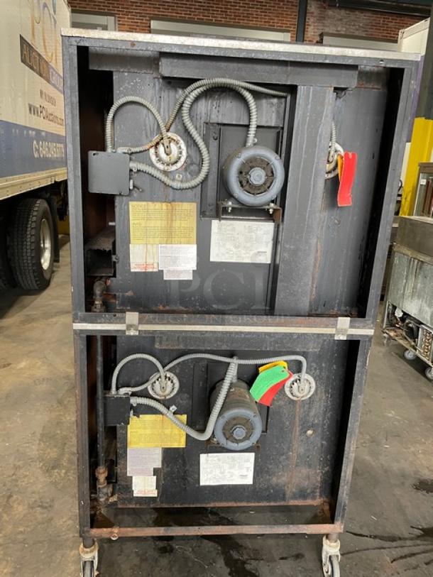 Blodgett Solid State Series double stacked convection oven, stainless steel, natural gas, on casters, wired racks, visible labels.