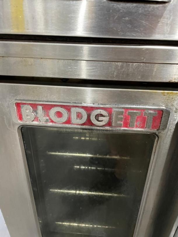 Blodgett Solid State Series stainless steel double-stacked convection oven, natural gas, wired racks, on casters.