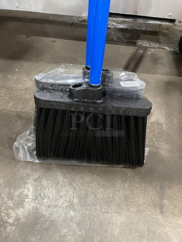 Carlisle Duo-Sweep broom, model 3686403, new condition. Blue handle, black bristles, light industrial use.