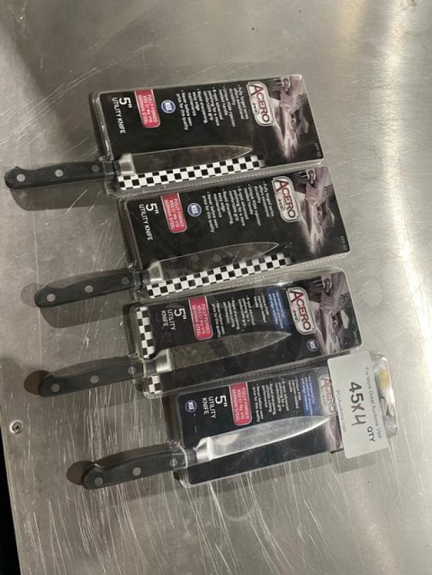 Winco Acero Series 5" Utility Knife, Model KFP-50, with black grip handle, new condition, original packaging visible.