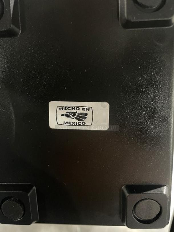 Black Jofel tabletop tall-fold napkin dispenser, new condition, label reads "Hecho en México," durable commercial use.