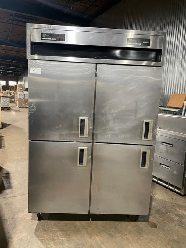 Delfield/Alco stainless steel 4-door dual-zoned refrigerator/freezer combo, includes poly coated wire racks, on casters.
