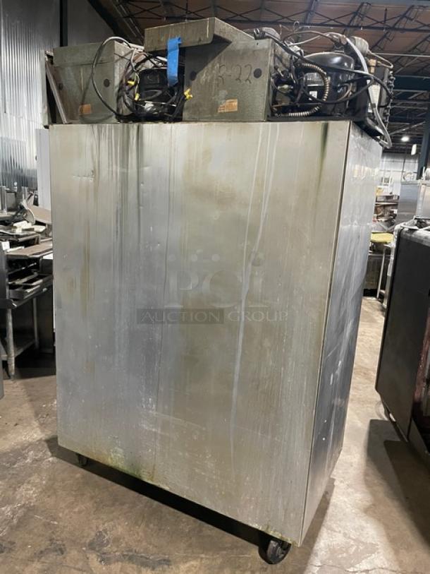Delfield/Alco 4-door stainless steel fridge/freezer combo with poly-coated wire racks and casters, dual-zoned.