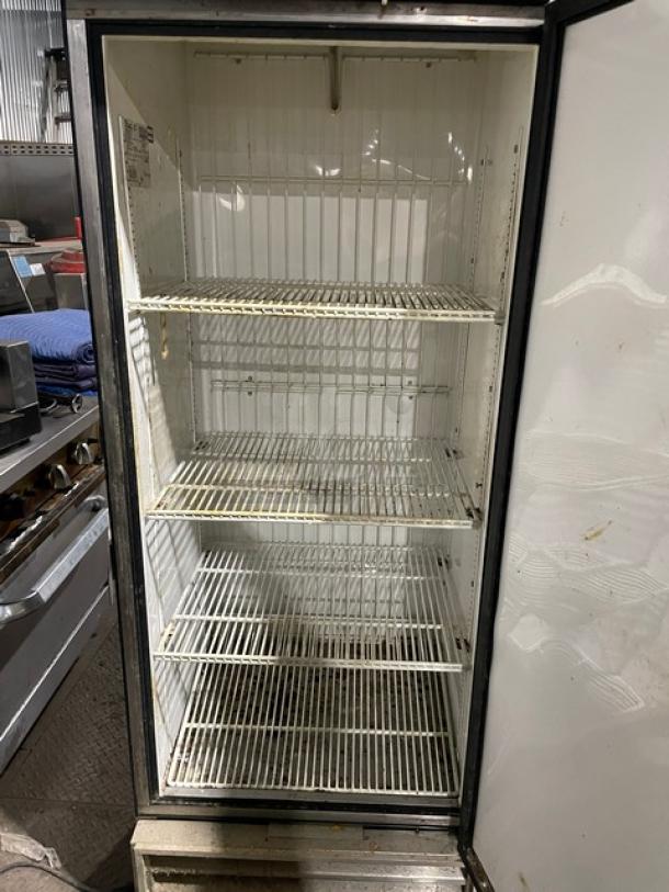 True T-19FZ commercial reach-in freezer, stainless steel, single door, poly coated wire racks, on casters, 115V.