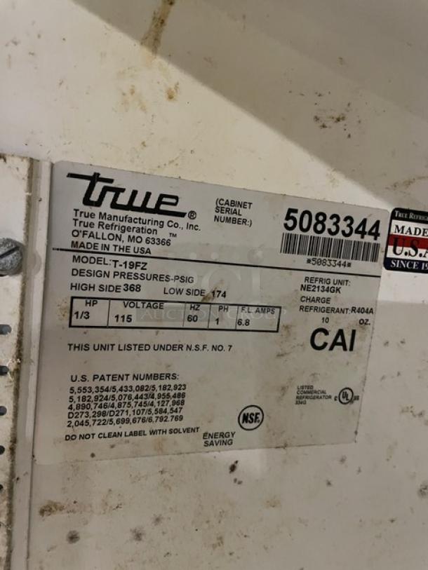 True T-19FZ stainless steel reach-in freezer, single door, poly-coated wire racks, 115V, 1 phase, on casters, SN: 5083344.