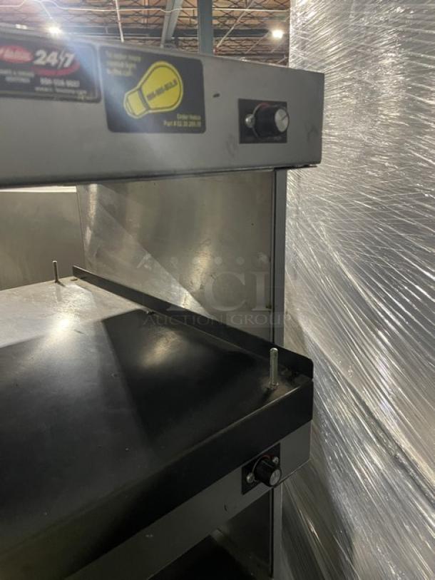 Hatco Glo-Ray GRSDH-41D Commercial Double-Tier Heated Merchandiser in gray granite, visible controls and label, electric-powered.