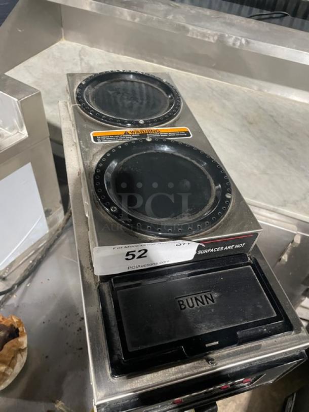 Bunn VP17-3 commercial stainless steel pour-over coffee brewer with three warmers, label indicates surfaces are hot. Model VP17-3 SN: VP17256079, 120V, 1 Phase.