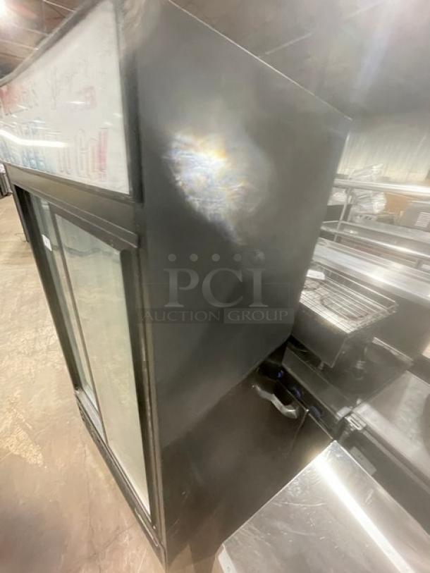 Beverage-Air MT38-B commercial refrigerator, black, double glass sliding doors, poly-coated wire racks, 115V, 1 phase.