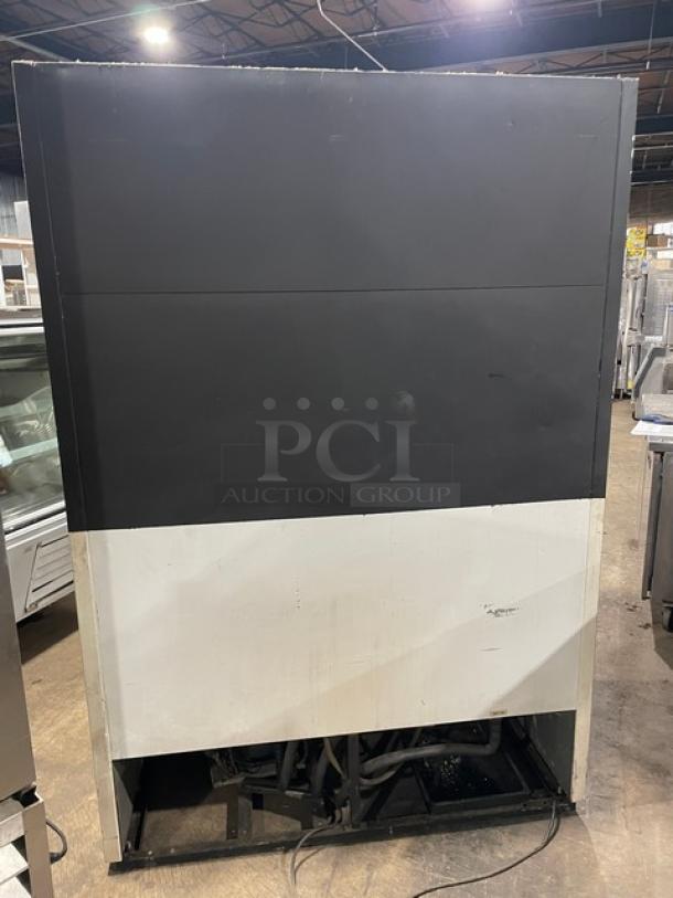 True GDM-49 commercial double glass door refrigerator with poly-coated wire racks, SN: 1-2601155, 115V, 1 phase.