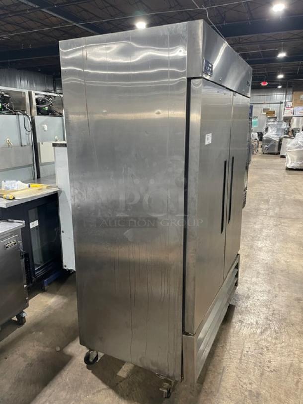 Arctic Air AR49E stainless steel 2-door reach-in refrigerator, Energy Star certified, on casters, with poly-coated wire racks.
