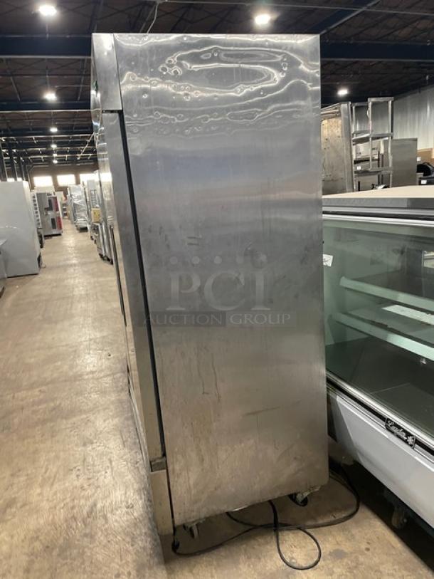Arctic Air AR49E stainless steel 2-door reach-in refrigerator, Energy Star certified, on casters, with poly-coated wire racks.