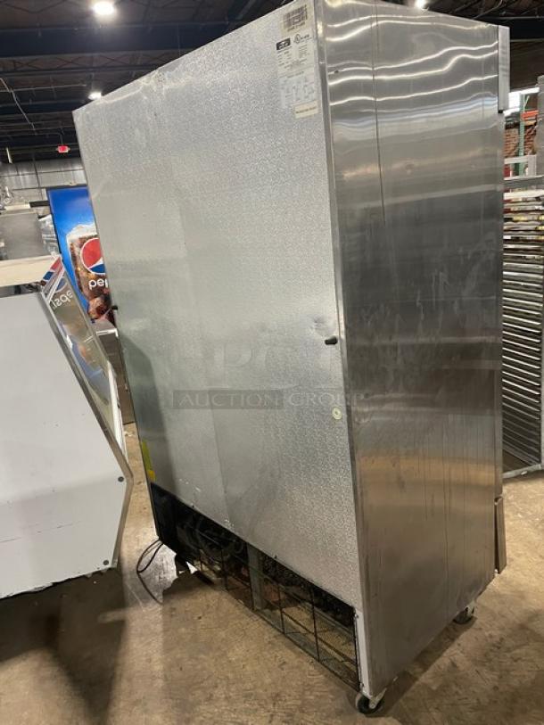 Arctic Air stainless steel 2-door refrigerator, model AR49E, on casters. Energy Star certified, with poly-coated wire racks.