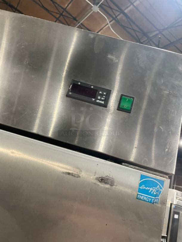 Arctic Air AR49E 2 Door Refrigerator, stainless steel, Energy Star, with poly-coated wire racks, 115V, on casters.