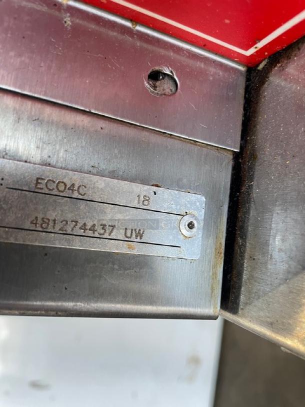 Vulcan EC04C stainless steel convection oven tag showing model and serial number, metallic finish, slight wear visible.