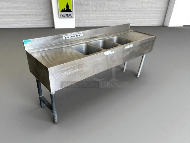 Supreme metal 3 compartment bar sink, excellent condition, fully tested. Includes tag indicating brand and functionality.