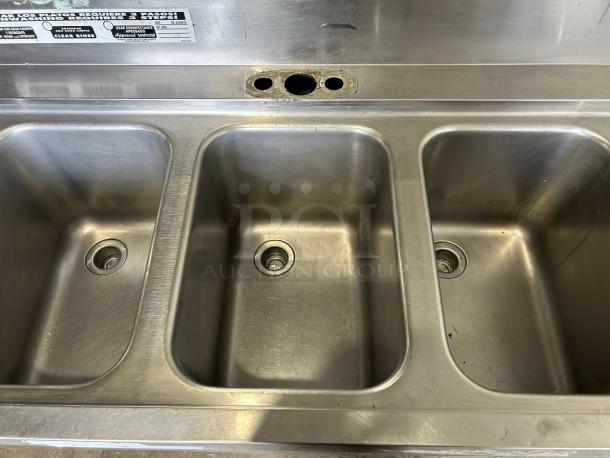 Supreme metal 3 compartment bar sink in excellent condition, fully tested and working. Features intact drains and faucet holes.