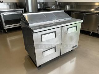 True TSSU-48-12D-2-HC 48 3/8" refrigerated sandwich prep table in excellent condition, with right door and two drawers.