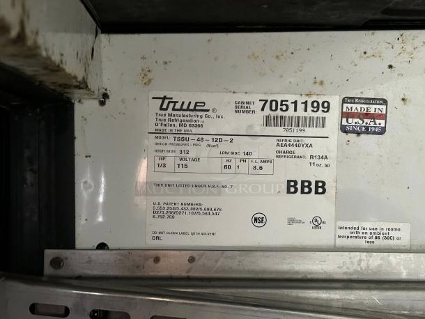 True TSSU-48-12D-2 refrigerated prep table label. Shows model, serial number, and NSF, UL certifications. Made in USA.