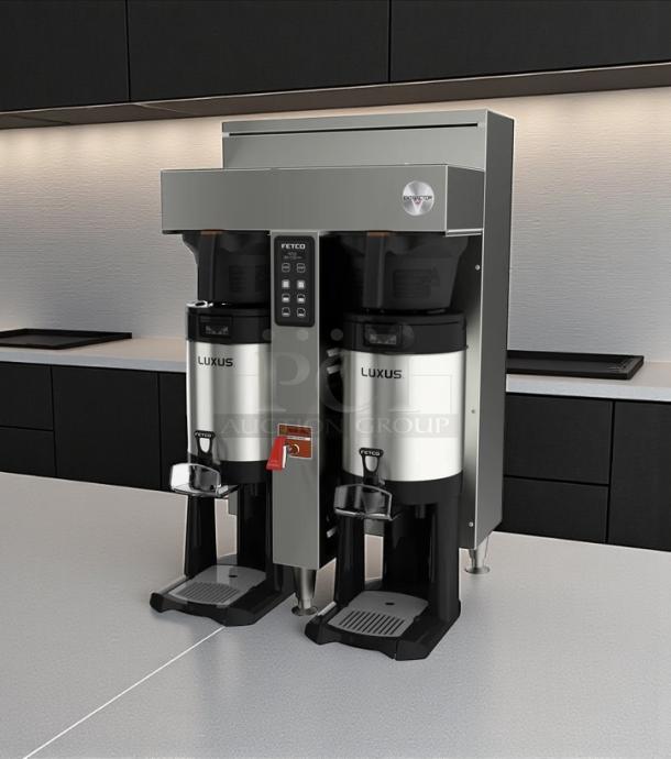 Fetco CBS-2052e dual station coffee brewer in excellent condition, fully tested, featuring Luxus dispensers, 208-240V.