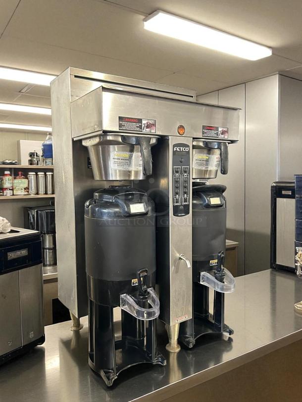 Fetco CBS-2052e Dual Station Coffee Brewer in amazing condition, 208-240V, fully tested and working, with visible warning labels.