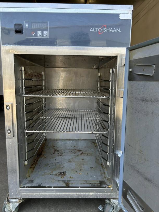 Alto-Shaam 500-S 6 pan holding cabinet, 208/240V, stainless steel, mobile, used condition, interior racks visible.