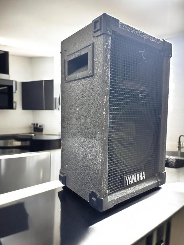 Yamaha 15" 2-way passive PA speaker, black, tested and working, slight wear on edges, Yamaha logo visible.