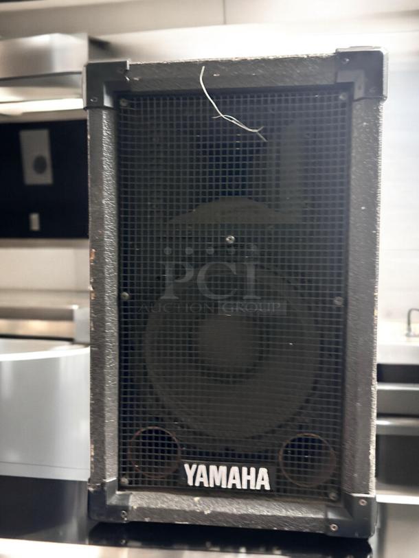Yamaha 15" 2-way passive PA speaker, black, tested and working, mesh grille with visible logo, minor wear on edges.