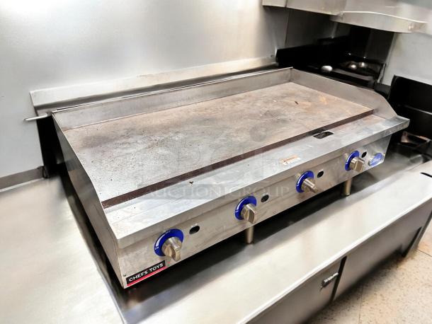 Globe GG48TG 48" gas griddle, thermostatic controls, natural gas, stainless steel, tested, excellent condition.