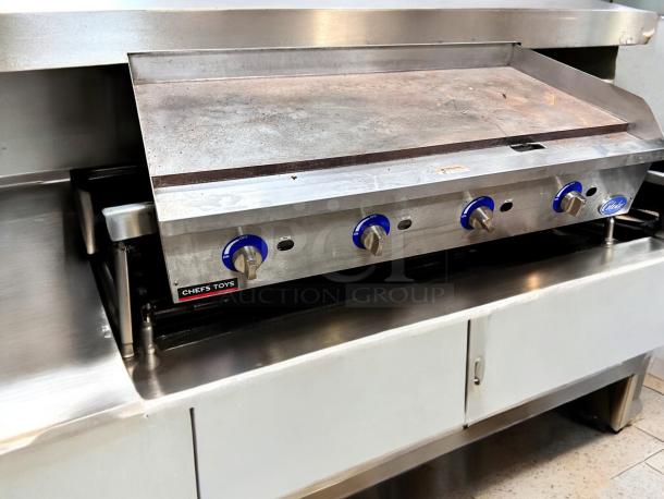 Globe GG48TG 48" countertop gas griddle, stainless steel, thermostatic controls, natural gas, excellent condition, fully tested.