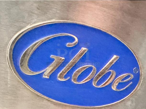 Globe logo on the GG48TG gas griddle. Features 48" countertop design, thermostatic control, natural gas. Fully tested.