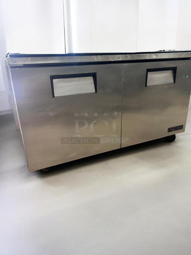 True TWT-60F stainless steel two-door worktop freezer with backsplash. Tested, working condition. 60", 115V.
