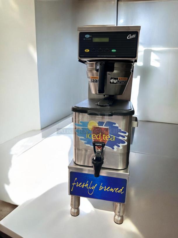 Curtis TBP Iced Tea Brewer, 3-gallon, 120V, fully tested. Stainless steel, labels "iced tea" and "freshly brewed" visible.