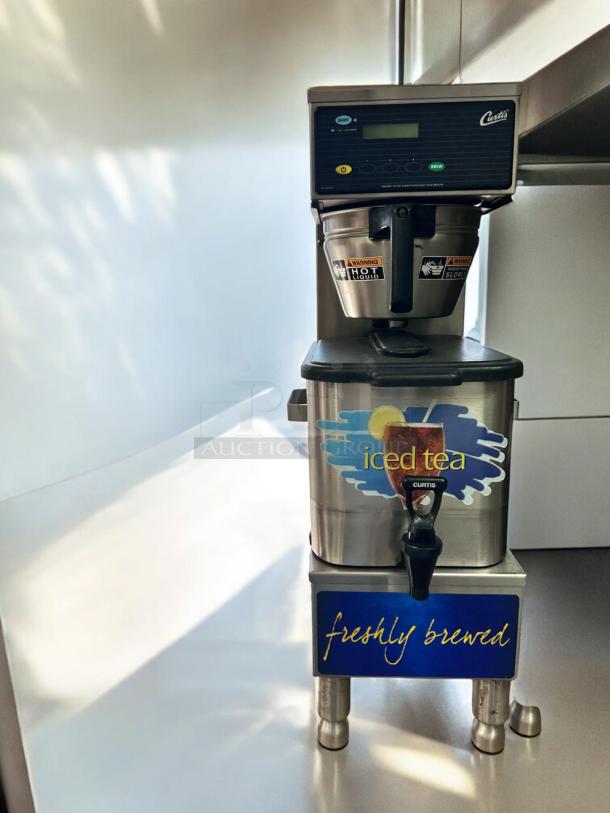 Curtis TBP iced tea brewer, 3-gallon capacity, 120V, fully tested, working. Displays "freshly brewed" and "iced tea" graphics.