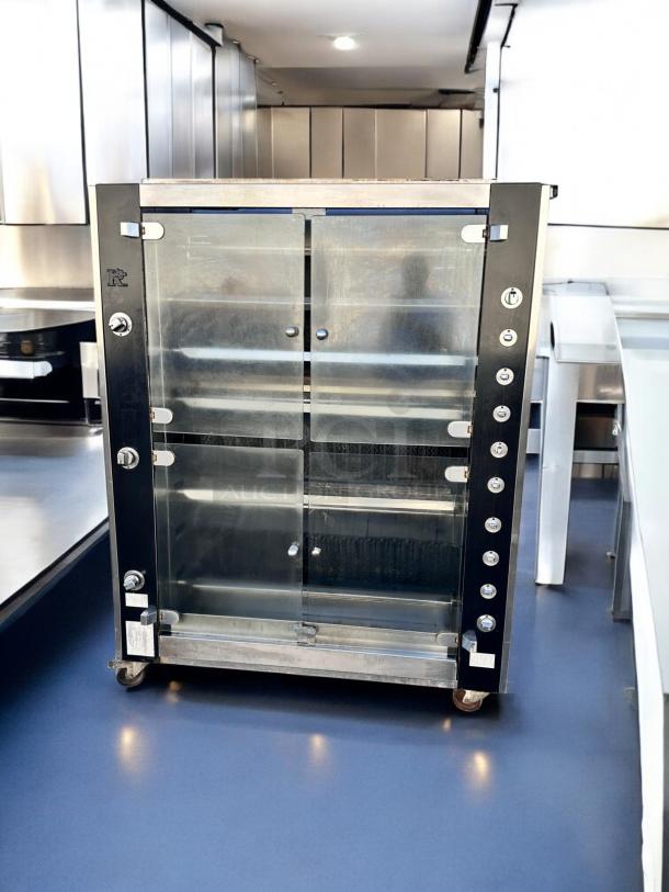 Rotisol RR-20 rotisserie oven, 20 spit capacity, outstanding condition, natural gas, glass doors, stainless steel finish.