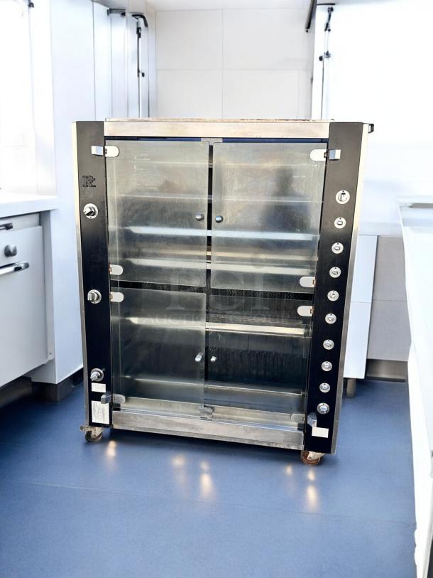 Outstanding Condition Rotisol RR-20 rotisserie oven, 20 spit capacity, natural gas, glass doors, fully tested, on casters.