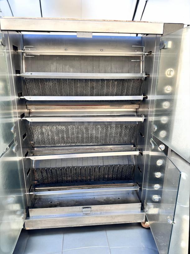 Rotisol RR-20 rotisserie oven, 20 spit capacity, natural gas, outstanding condition, fully tested, open door view.