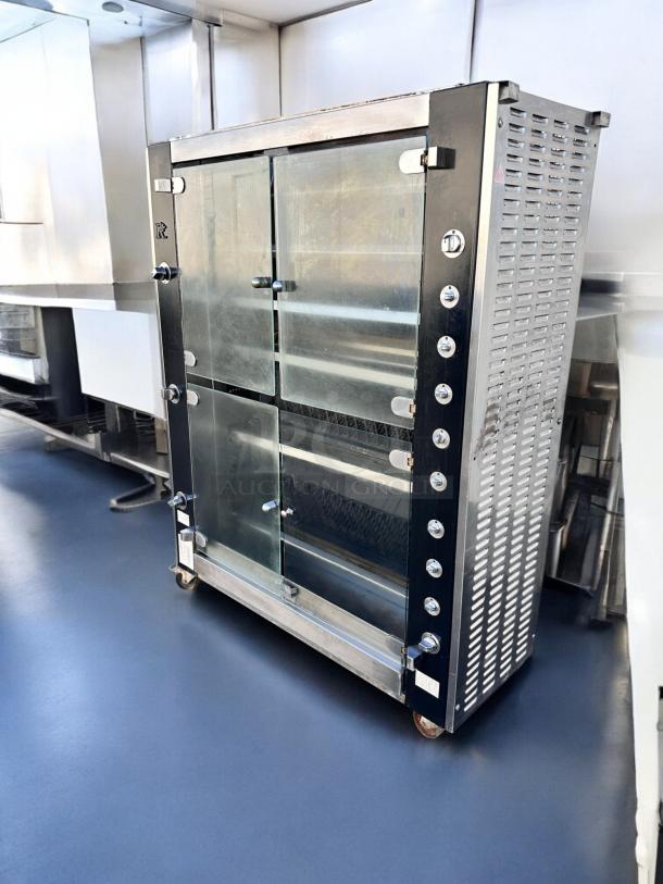 Rotisol RR-20 Rotisserie Oven, 20 spit capacity, natural gas, outstanding condition, glass doors, fully tested and working.