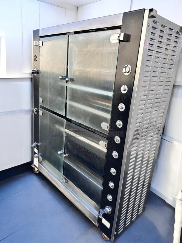 Rotisol RR-20 rotisserie oven, 20 spit capacity, natural gas, in outstanding condition, visible controls, glass doors.