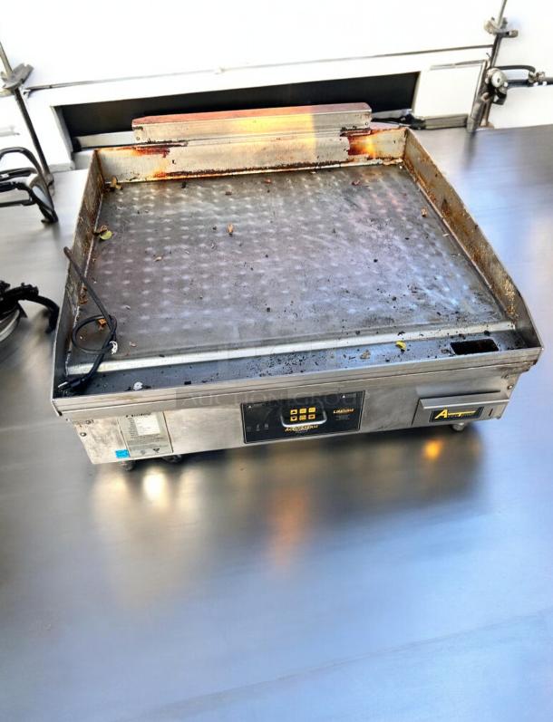 AccuTemp EGF2083A2450-T1 griddle, 36" wide, 208V. Used condition, stainless steel, fully tested, working. Control panel visible.