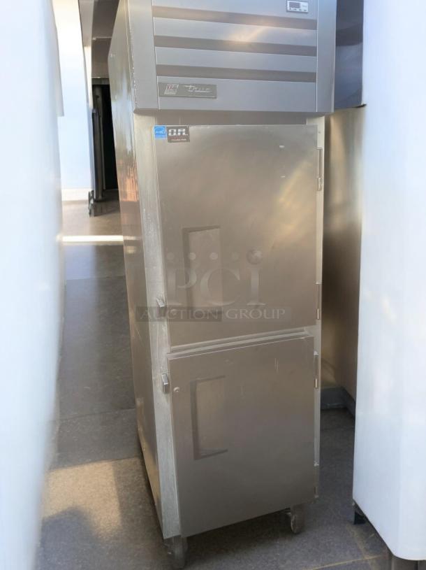 True T-23DT-2-HC dual temp refrigerator/freezer, stainless steel, 23 cu. ft., fully tested, on wheels, visible brand labels.