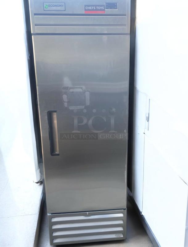 Economy Single Door Upright Freezer, stainless steel, commercial use, 115V, fully tested and working, visible branding.
