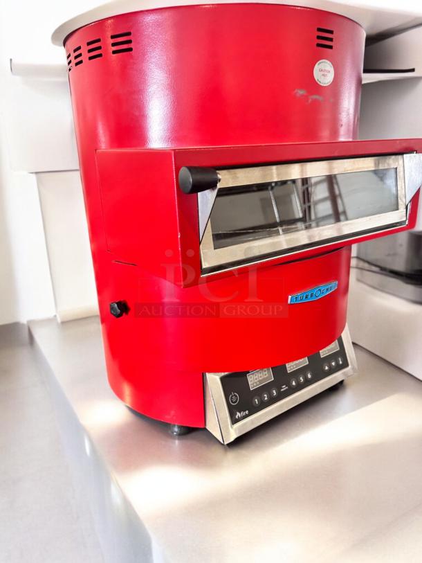 TurboChef Fire high-speed countertop pizza oven, 208/240V, in excellent condition with digital controls and TurboChef branding.