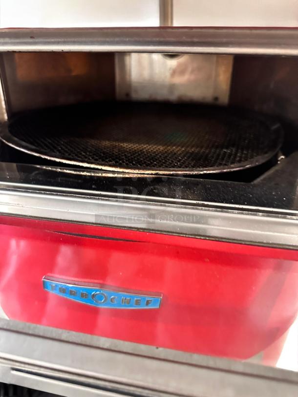 TurboChef Fire high-speed countertop pizza oven in excellent condition, 208/240V, fully tested, red exterior with logo.