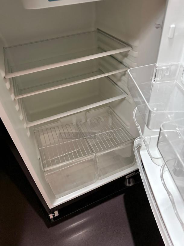 Magic Chef HVDR1040B 2-door compact refrigerator/freezer in black, shown open with clean shelves. Fully tested and working.