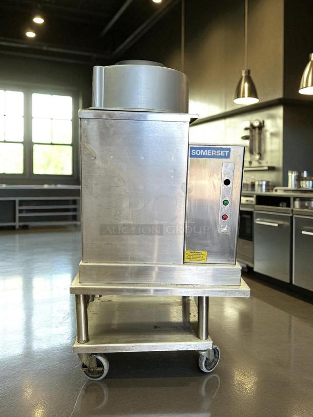 Somerset SDR-400 dough rounder, excellent condition, stainless steel, tested working, 115v, warning label visible.