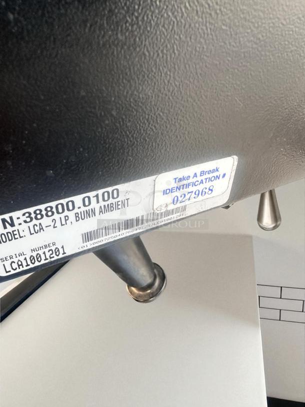 Bunn LCA-2 LP 38800.0100 coffee dispenser label; serial LCA1001201, identification #027968, fully tested.